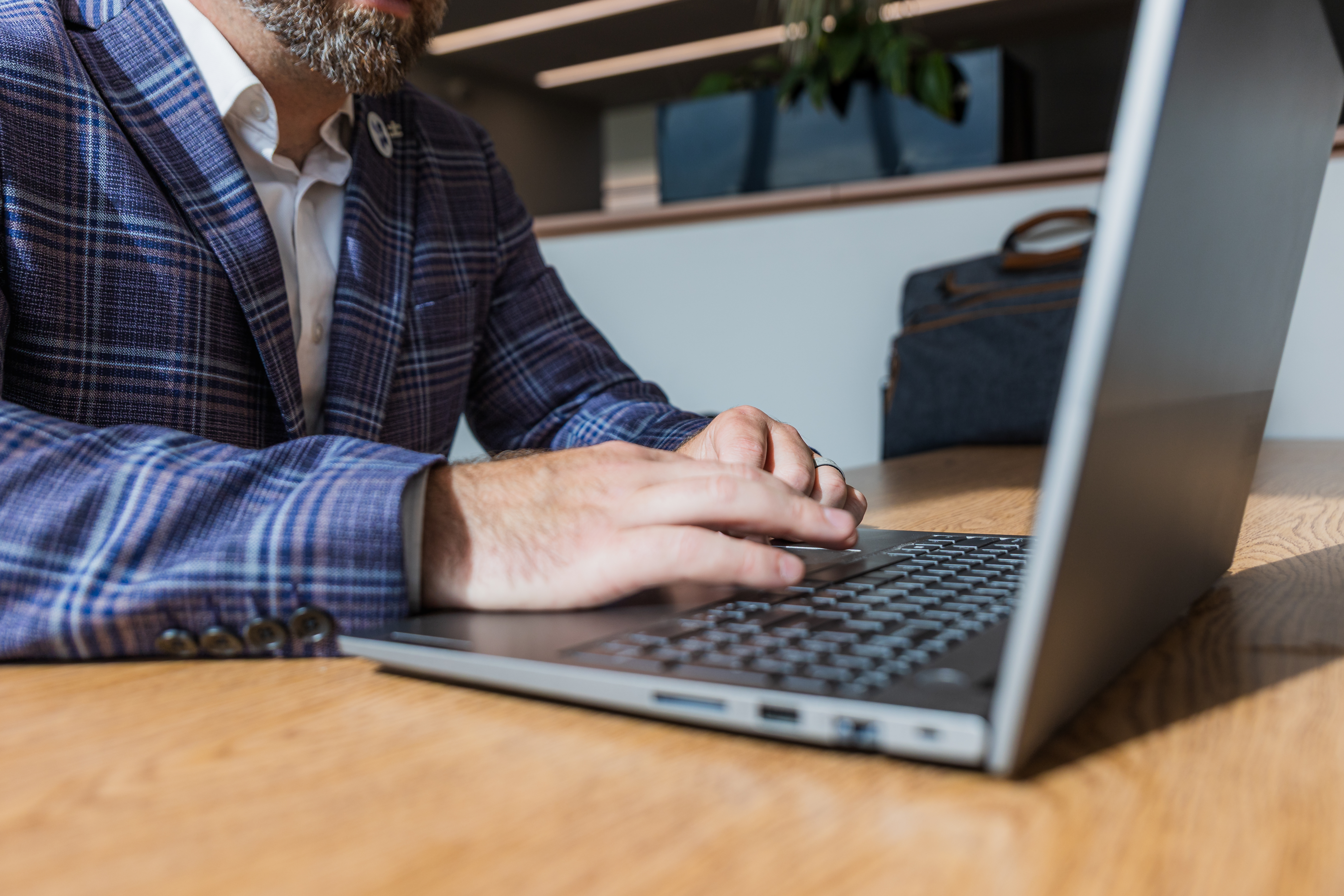Man on laptop in an office